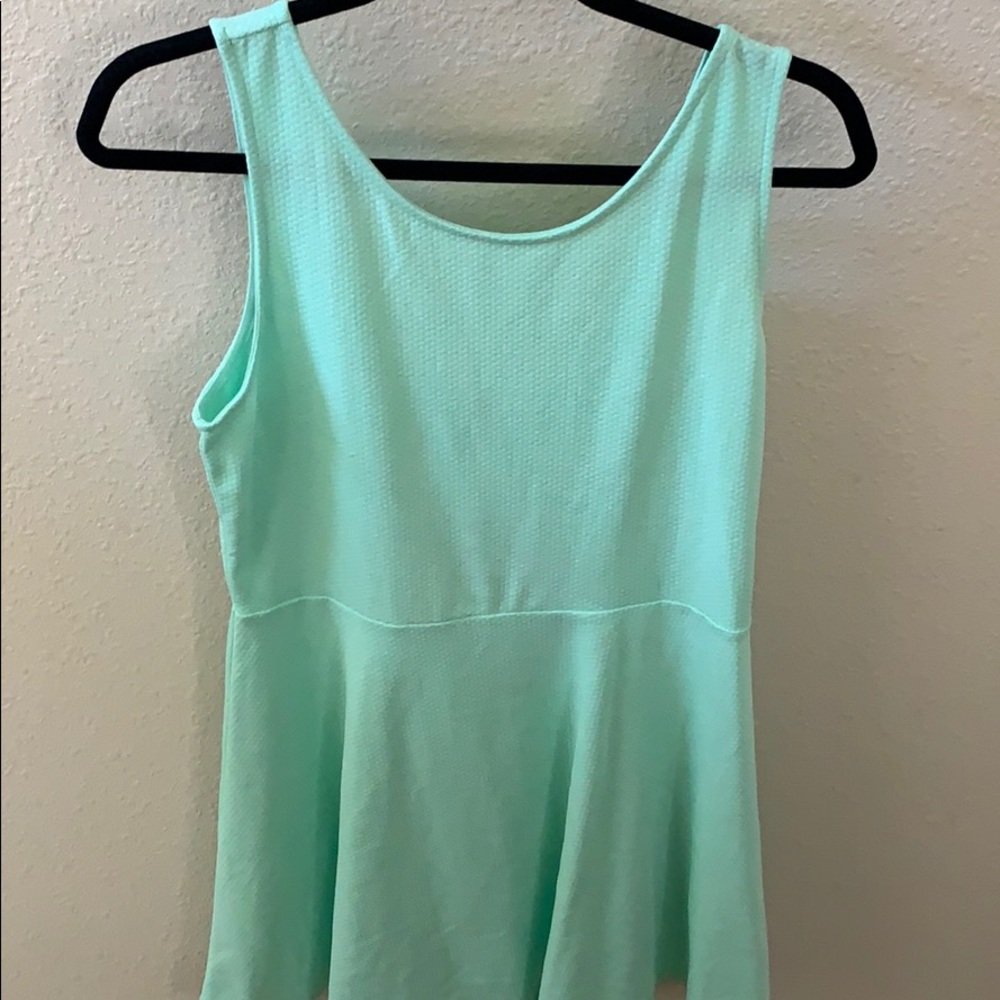 Mint green dress with keyhole cutout in the back!